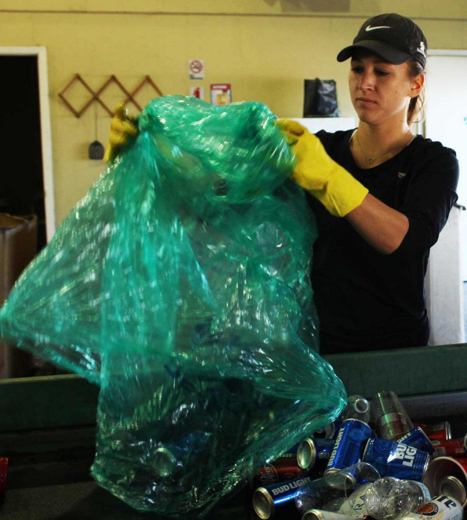 Recycling sorting volunteers gather at the Oxford Recycling Center on South Lamar on Mondays and Tuesdays after home games. Photo By Taylar Teel