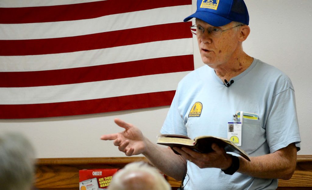 Thomas Nix gives a devotion before breakfast at headquarters. Photo by Marlee Crawford