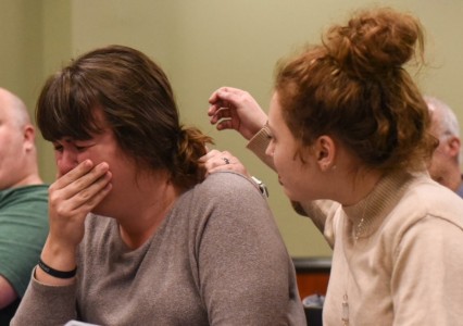 Organizer of Starkville Pride and the Pride Parade Bailey McDaniel cries after hearing the 4-3 vote denying their request for a LGBT Pride parade during the Starkville Board of Aldermen meeting Tuesday night. (Photo Courtesy: Logan Kirkland, Starkville Daily News)