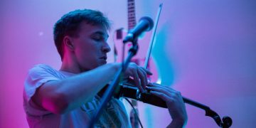 The fiddler in a suit