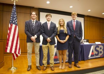 Andrew (A.J.) Heskett, Wils Davis, Kaylee Goff, and Jack Jones stand in front of ASB senate