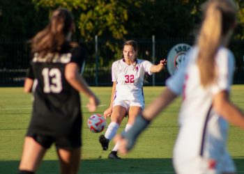 Taylor Radecki passes the soccer ball