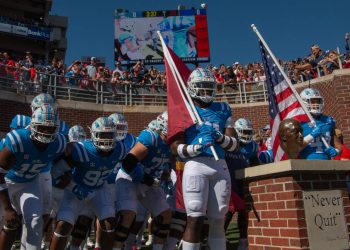 Rebels improve on shaky start, cruise in second half to defeat Vanderbilt 52-28