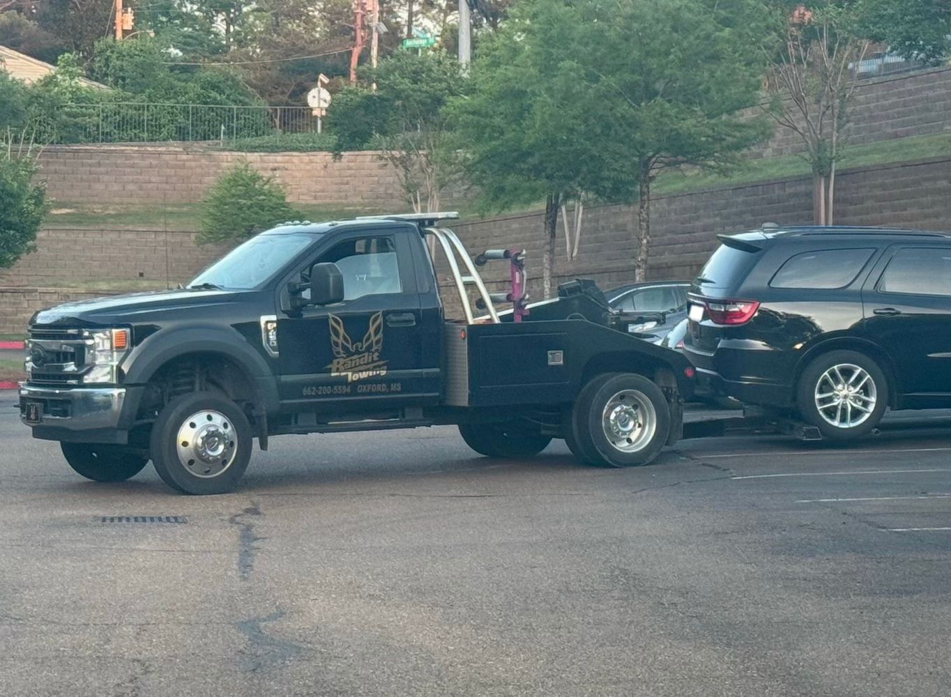 A vehicle is towed on May 10. Photo by Ashton Summers