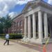 Section of concrete pediment falls onto Business Row at Holman Hall
