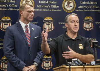 Families scramble for answers following immigration raids; 680 people working at food processing plants detained